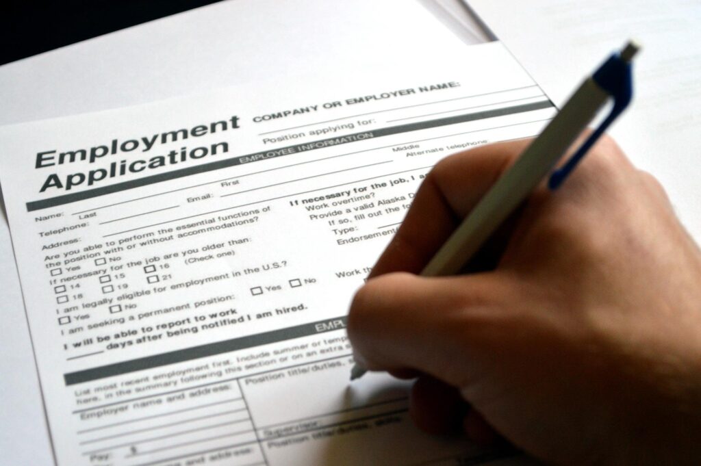 Paper "employment application" form for recruitment process
