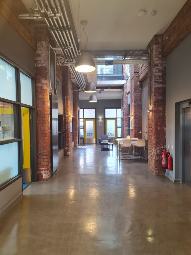 Industrial looking corridor, exposed brickwork